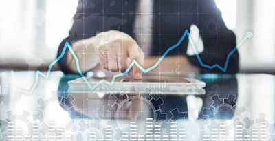 Business person interacting with cost diagram in a virtual screen representing cost optimization with Multidisciplinary Design Optimization.